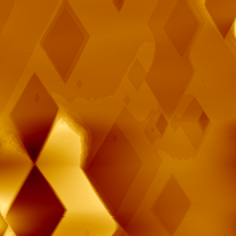 Etch Pits in a dissolving insulin crystal Etch Pits in a dissolving insulin crystal